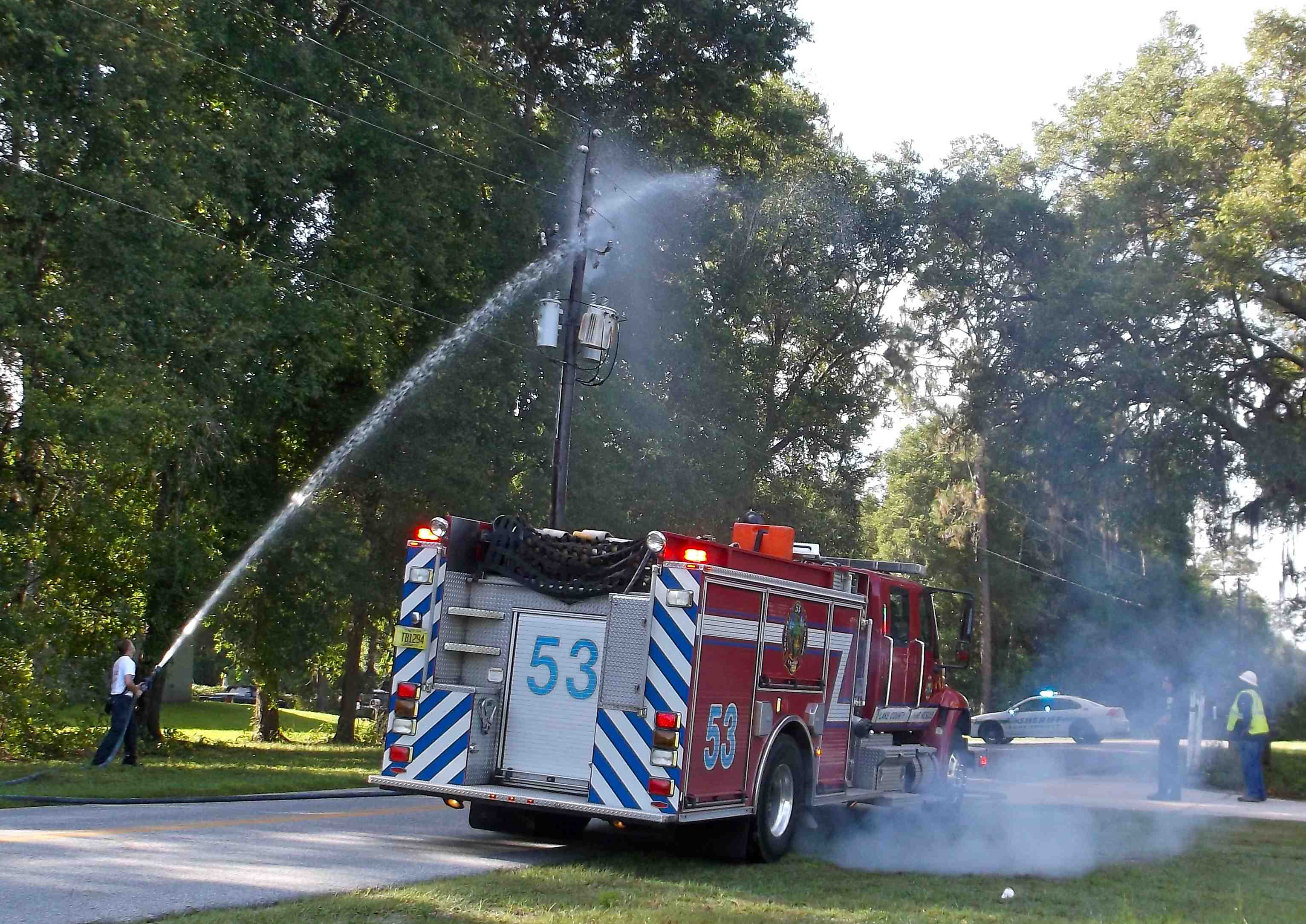 Lake County Fire Rescue puts out a fire at a power pole on Rolling Acres Road.