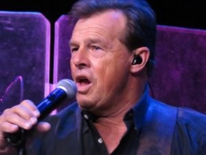 Sammy Kershaw singing a country song.