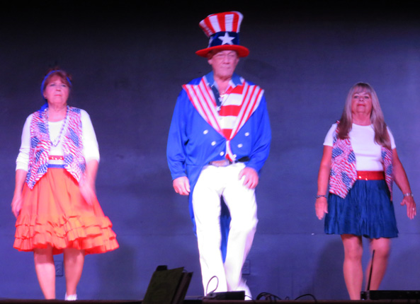 Sandy Duncan, left, dances Leo Bitz as Uncle Sam and Darlene Wooomer