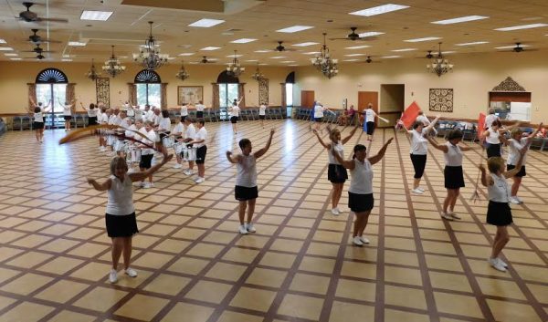 The Villages Twirlers and Drum Corps rehearse at La Hacienda Recreation Center.
