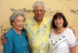Villagers, from left, Milagros and Hector Bueno and Peggy Avila are Pat Boone fans