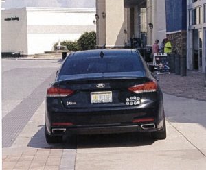 The driver of this car received a $116 ticket after parking on the sidewalk at Best Buy.