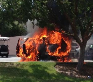 A vehicle erupted in flames Saturday afternoon in the parking lot of Orange Blossom Hills Country Club.
