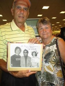 David and Rosemary Gerisch hold a picture from the 1970s when David Gersich met the Captain and Tennille.