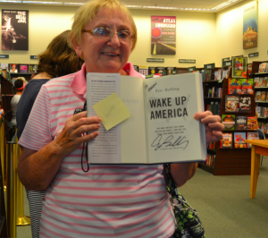 Helen Gale of Tamarind Grove shows off her autographed book..