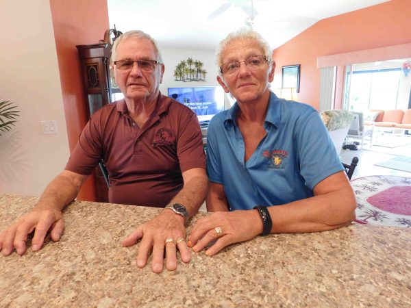 Jerry and Chris Pusch wears rings that they got back after they were stolen from their home.