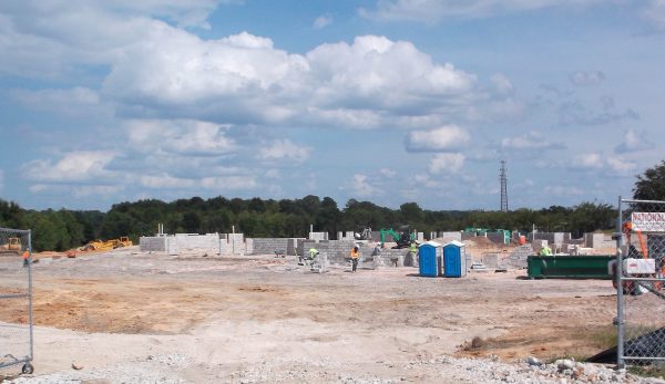 A crew is working on a new clinic on Rolling Acres Road.