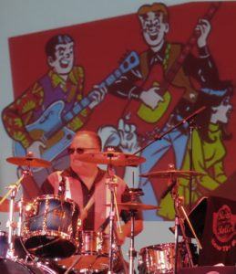 Gerry "Rocky" Seader keeps the beat to the Archies hit "Sugar Sugar" sung by Ron Dante.