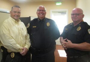 Fruitland Park Sergeant Eric Luce, who will be working at the substation in the Moyer center, with Chief Michael Fewless and Deputy Chief Dennis Cutter.