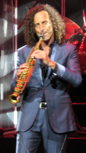 Kenny G playing on stage,