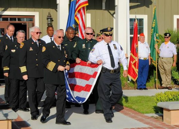 Law enforcement and firefighters participate in a past 9/11 ceremony in  The Villages.