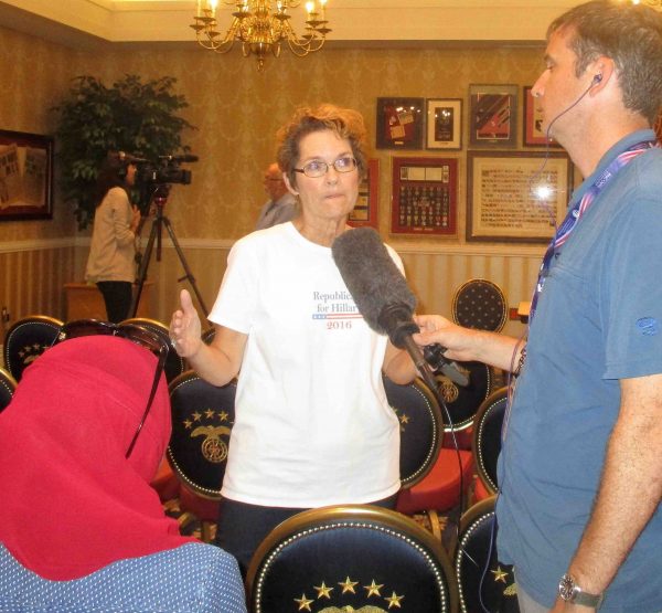 Linda Fogg is interview by NPR on Thursday at Eisenhower Recreation Center.