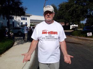 Villager Joe Elliott campaigns Wednesday at Laurel Manor Recreation Center.