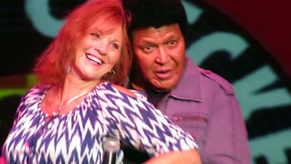 Vanita Turner dances on stage with Chubby Checker.