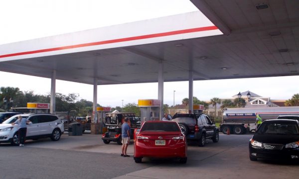 Customers were eagerly filling their gas tanks at Shell at Colony Plaza.