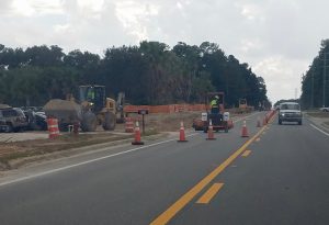 Work on Rolling Acres Road has caused traffic backups.