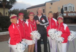 Hearts for our Hospital event organizer Pat Gillis with Villages Cheerleaders.