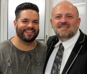 Maestro Bill Doherty stops backstage at the Dr. Phillips Center in Orlando to talk to his former student Fernando Varela. Doherty performed in Varela's PBS Special.