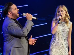 Teen singing star Jackie Evancho powers her way through a duet with Fernando Varela.