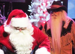 Santa checks out William Lee Golden's beard.