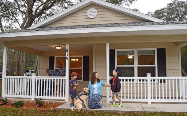 The Strickler family at their new home.