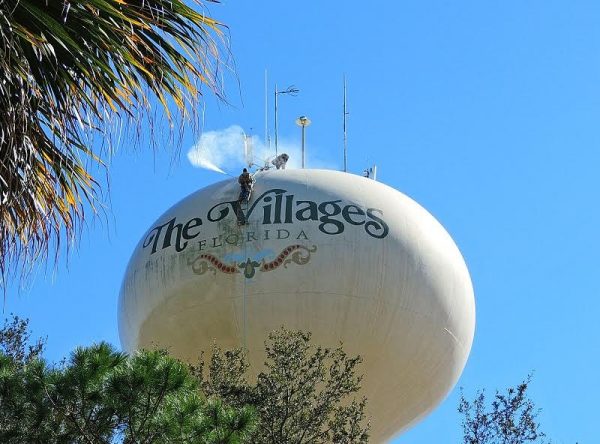A crew has been pressure washing the Orange Blossom Hills water tower.