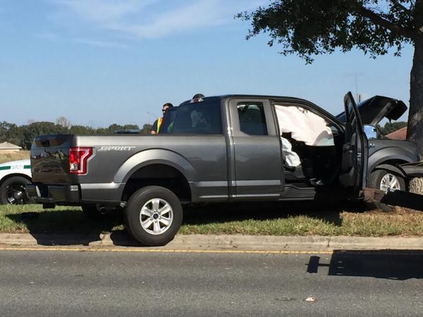 A woman suffered a medical episode moment before her truck hit a tree on County Road 466.