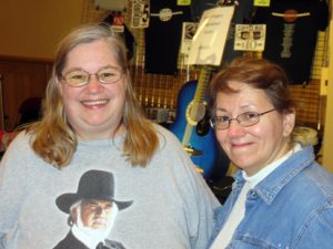 Anita Alferes, left, and Dawn Vello are Kenny Rogers fans.