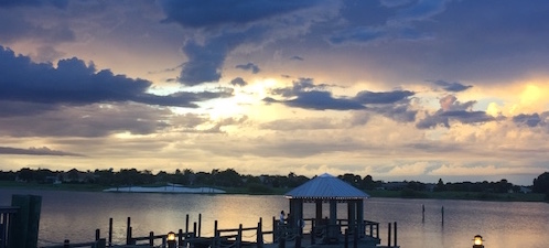 Folks enjoying the sunset at Lake Sumter Landing