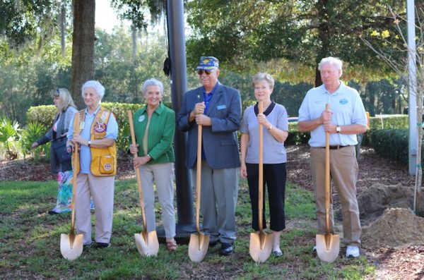 Doris Turlo,of the Orange Blossom Gardens Lion's Club, Betty Senter of the Lady Lake Garden Club, Mayor Jim Richards, Comissioner Ruth Kussard and Commissioner Tony Holden plant a tree to commemorate Arbor Day.