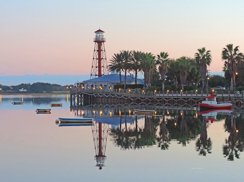 Red glow at dawn overlooking Lake Sumter Landing