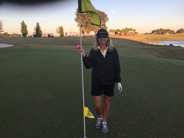 Laura Ball of the Village of Hillsborough get her first hole-in one on the third hole at Palmetto Executive Golf Course.
