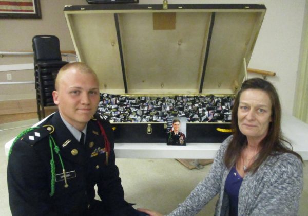 Nicholas’s best friend Cadet Lt. Col Andrew Harbin and Nicholas’s mother Maria. Nicholas' picture is at center.