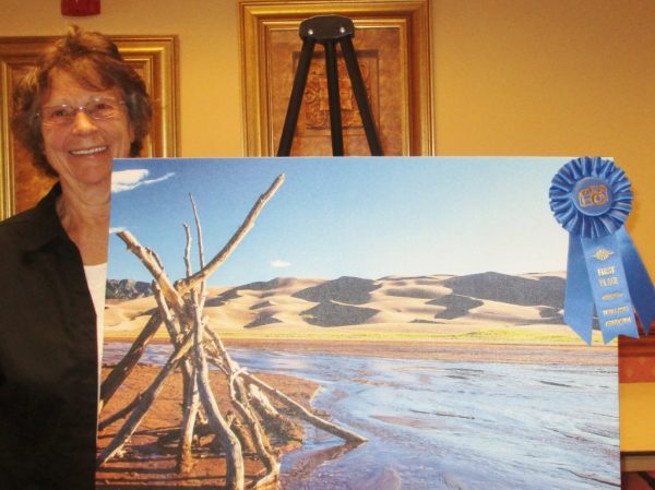 Betty Eich with her first place photograph “Dunes.”