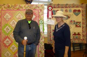 Paul and Martha Besse. Dawn Mitchell’s quilt is on the right.