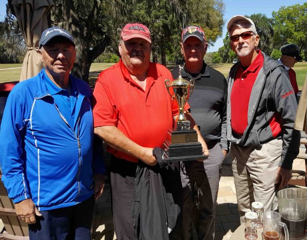 John Carlson, John Dunn, Frank McDermott and Jim Gaffney won the 11th annual Rinky Dink Golf Scramble at Water Oak Country Club.