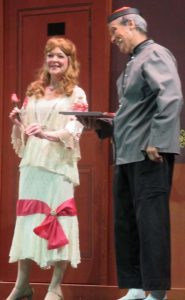Sally Spieth accepts a rose from Frank Olive.