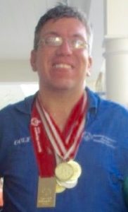 John O'Reilly Jr. with his Special Olympics medals.