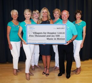 Music in Motion recently presented a check to Villagers for Hospice.
