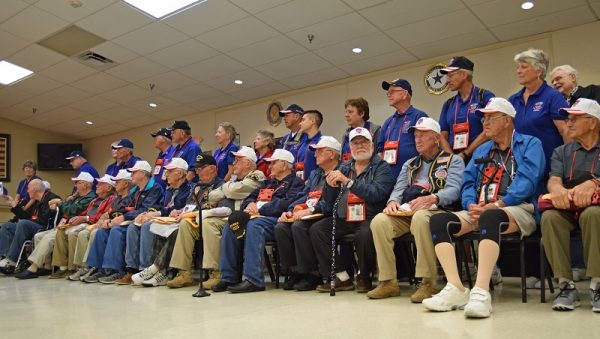 The welcome-home ceremony for the returning veterans was moved inside because of the weather.