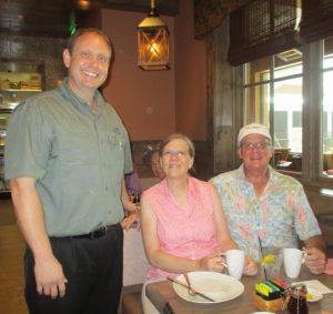 Fenney Grill manager Chad Prilliman with very satisfied customers Debbie and Joe Langmeyer.