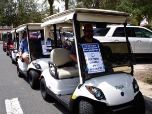 Golf carts traveled from Lake Sumter Landing to Brownwood and back during the rally.