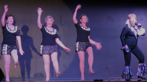 Lynne Albers, right, and Off Broadway Dancers kick up their heels.