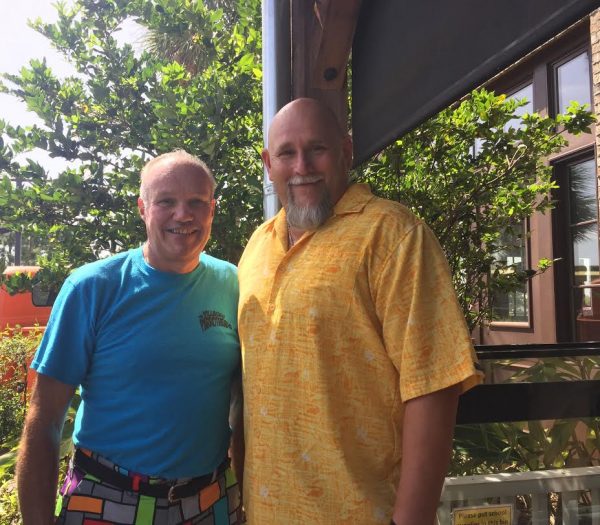 Villages Parrot Head President Lee Caron and Wildwood Middle High School Principal Richard Hampton