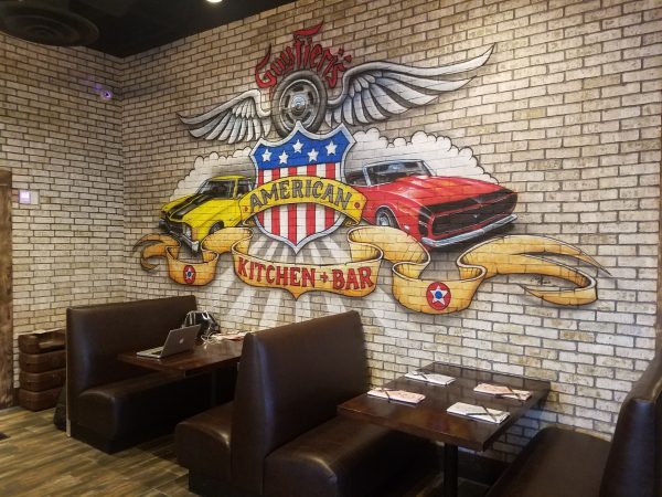 Each mural at Guy Fieri's American Kitchen and Bar was hand-painted