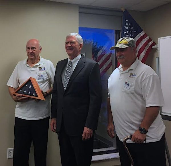 Congressman Daniel Webster is flanked by AFA President Howard Burke, left, and Vice President Anthony Arnold, right.