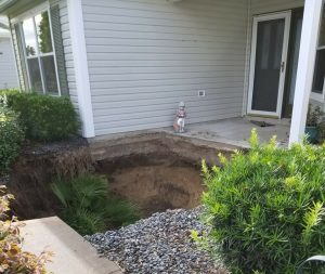 A couple in the Village of Glenbrook woke up to a sinkhole at their doorstep.