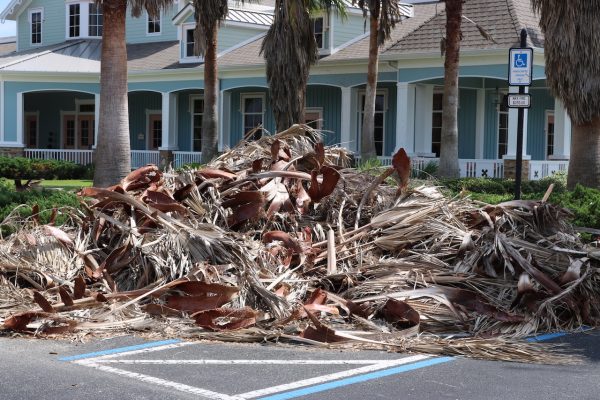 A pile of debris was in a handicapped parking space Sunday afternoon at Colony Cottage Recreation Center.
