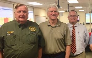Congressman Daniel Webster is flanked by Sheriff Bill Farmer and Sumter County Administrator Bradley Arnold at the county's emergency operations center.