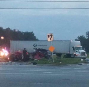 A man was killed when his truck collided with a trailer being towed by a semi early Tuesday morning on U.S. 301.